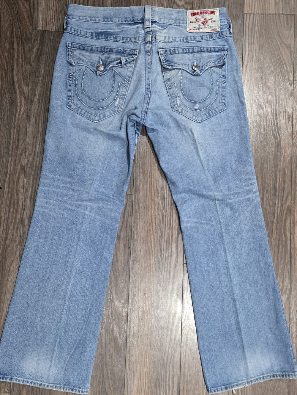 True Religion Men’s Billy Light Blue Bootcut Jeans with Signature Pocket Stitch